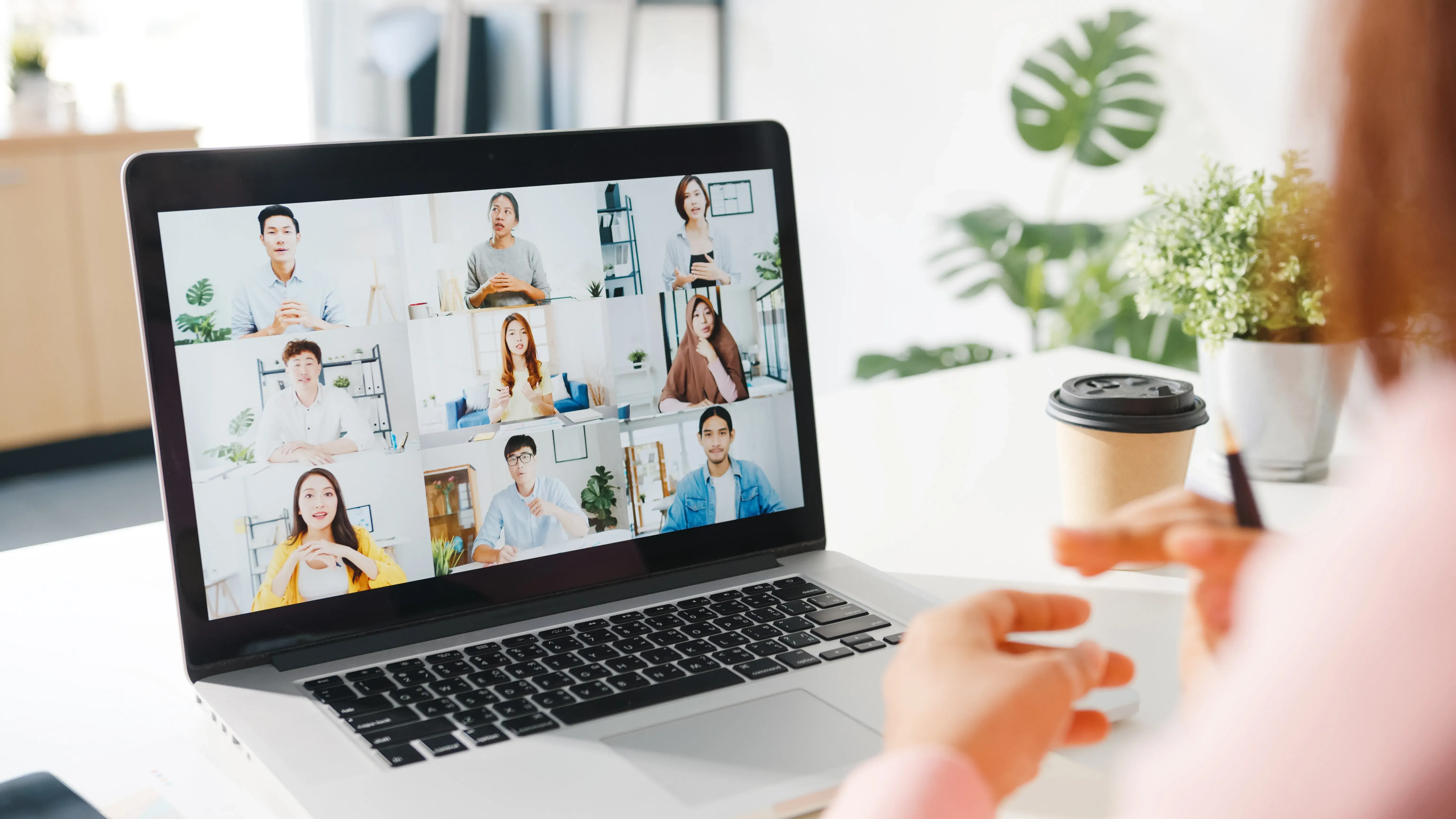 Laptop displaying an online video call